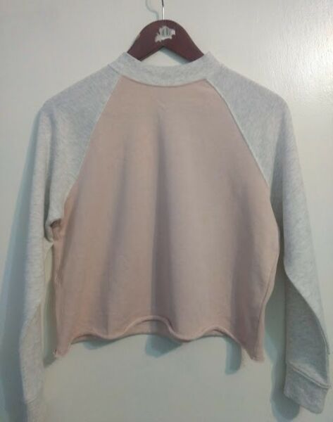 Sudadera rosa claro marca H&M