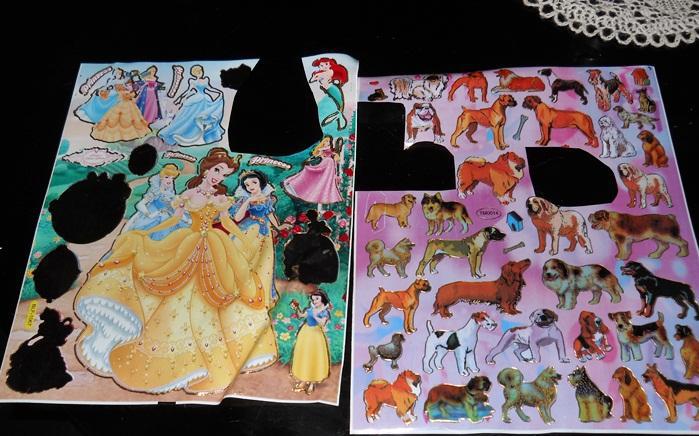 2 laminas de stickers incompletas princesas y razas de perro