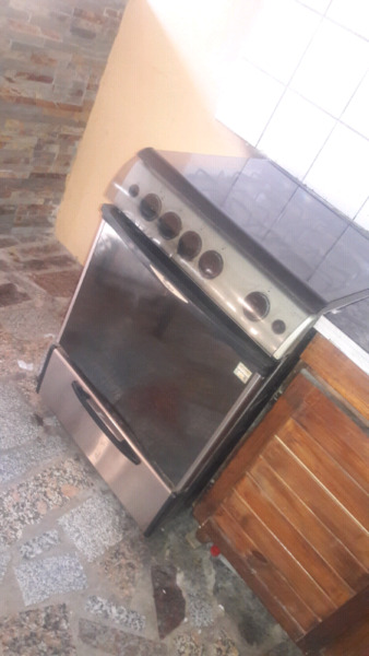 Cocina Whirlpool acero inoxidable vidrio templado cubre