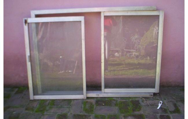 ventana aluminio corrediza+marco+vidrio(1x cada una