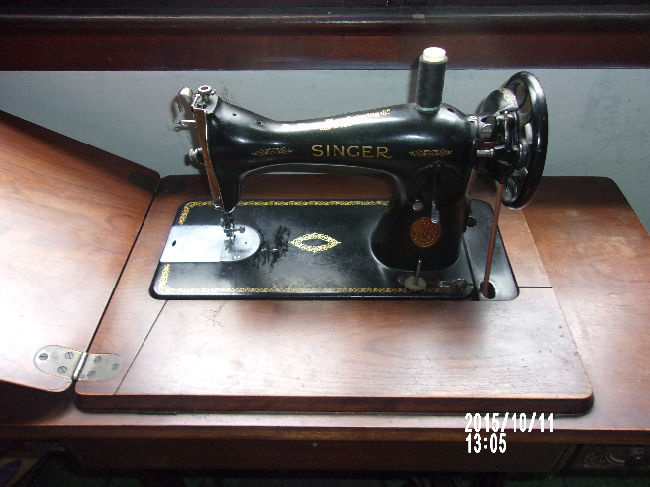 maquina de coser singer autentica $.-