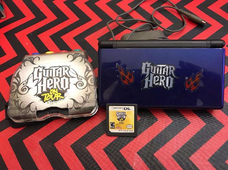 Nintendo Ds con Juego de Guitar Hero.