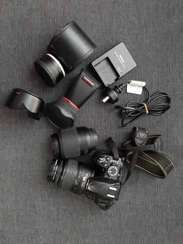 Cámara Nikon D3100 Con Lente 18.55 Y 55.200 Más Gran