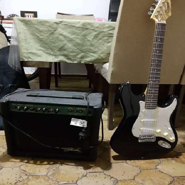 Guitarra electrica y amplificador de 20
