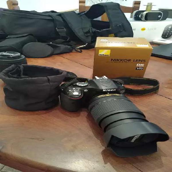 Cámara Nikon D5200 + 55-200mm + flash ttl + bolso y