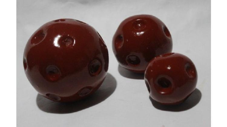 3 esferas color siena tostada con hendiduras, $ 150