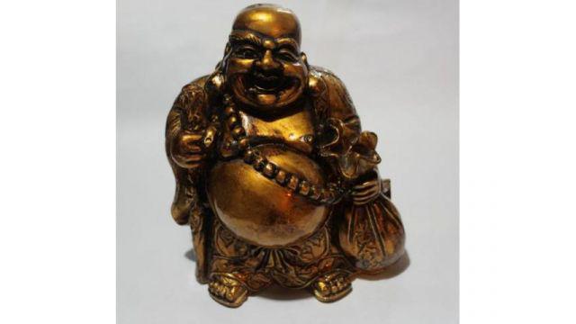 Buda con bolsa, de yeso, 23 cm, $ 200
