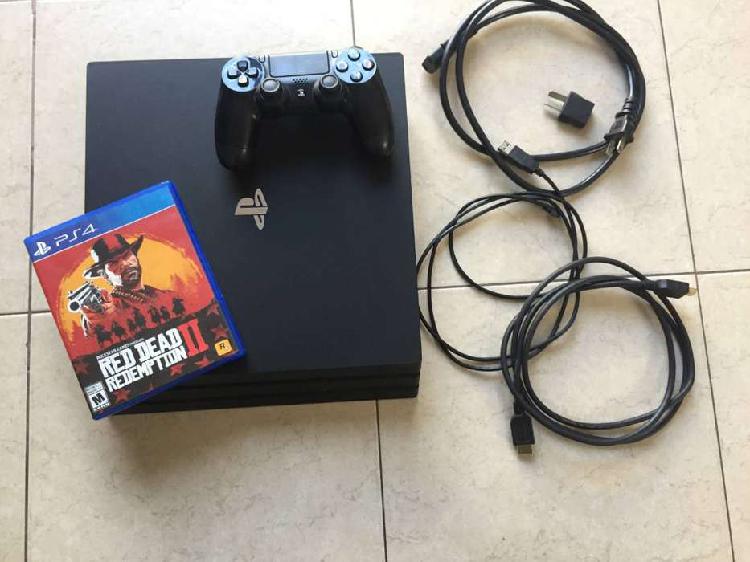 PS4 Pro 1TB (usada) con 1 (un) Joystick y un juego físico.