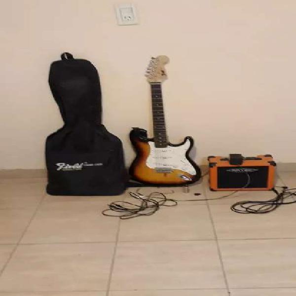 Vendo guitarra electrica( sin una cuerda)+parlante+un