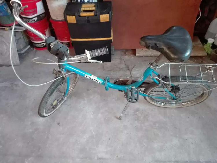 Bicicleta antigua plegable retro
