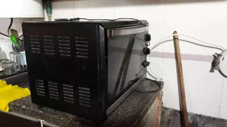 Vendo horno electrico semi nuevo