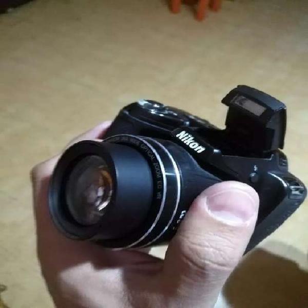 cámara Nikon permuto x celular