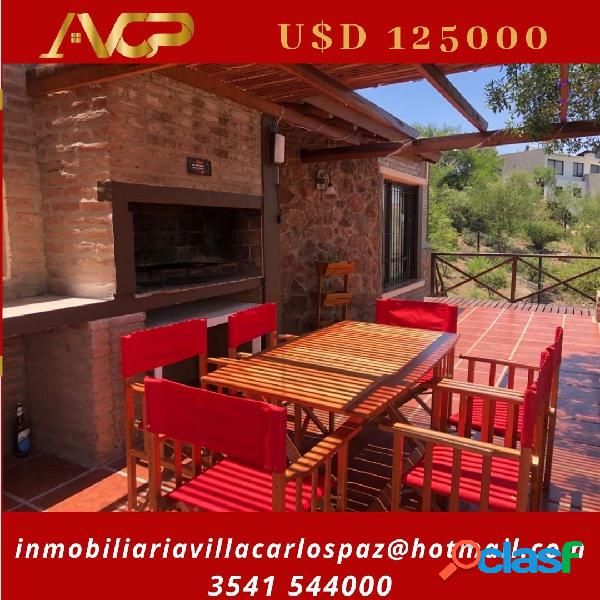 Casa con Pileta en villa del lago